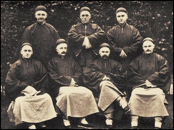 Portrait of the Cambridge Seven wearing Chinese dress